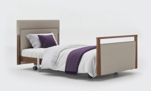 Upholstered profiling care bed in Walnut