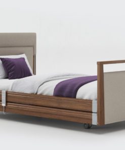 Upholstered profiling care bed with side rails inin Walnut